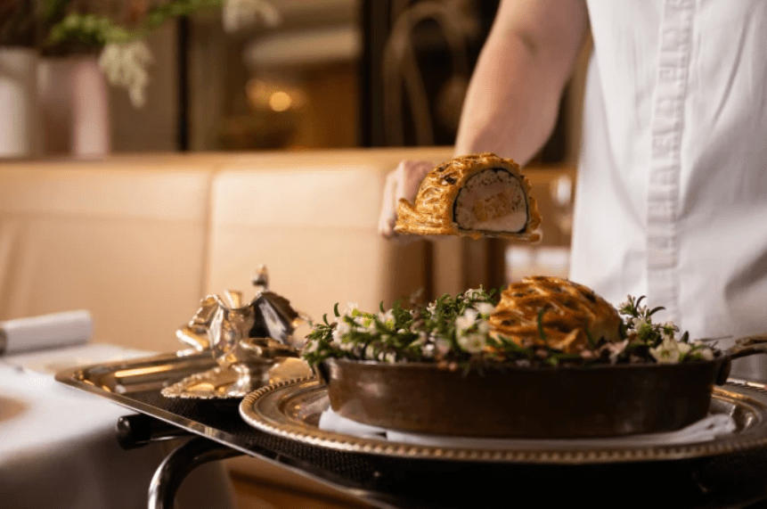 Aqualand-Etymon Projects-The Charles-Chef Billy Hannigan’s pithivier is plated up tableside, adding to the drama of the dish